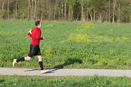 Man jogs on a path
